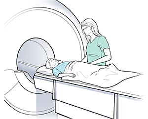 Boy lying on back on scanner table. Healthcare provider is preparing to move table into circular opening of MRI scanner.
